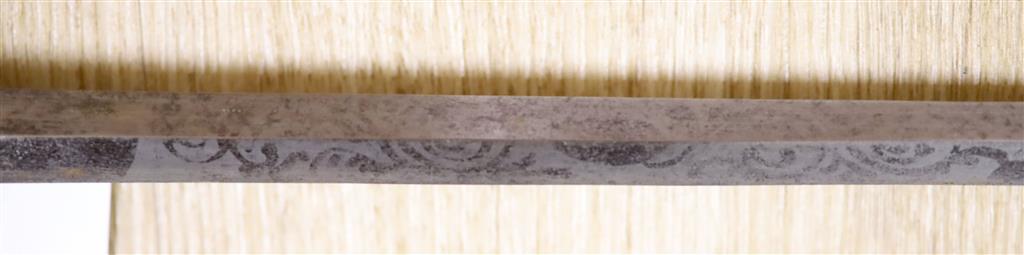 A Victorian sword cane, ivory lions head pommel with glass eyes, silver band H.M.Birmingham 1898, maker WS&ES, blade with traces